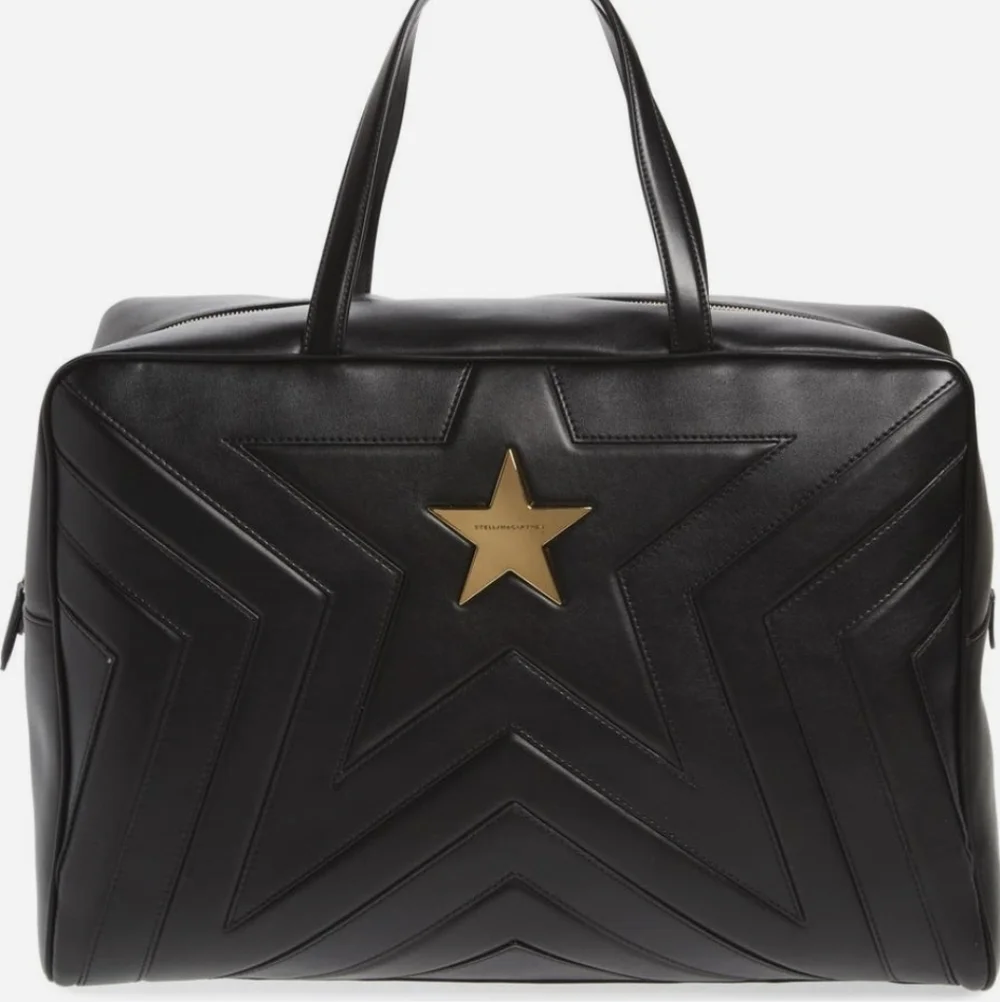Stella McCartney Alter Nappa Black Star Embossed Overnight Duffel - Picture 1 of 17